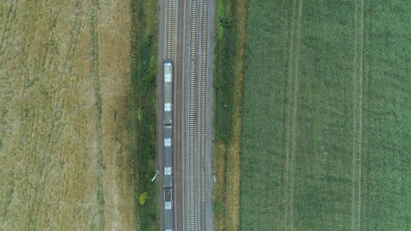 Bird's Eye View of a Commuter Train in the Countryside