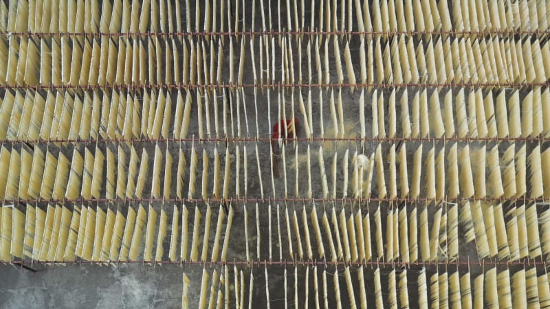 Aerial View of Drying of natural fibers for fabric, Barga, Rajshahi, Bangladesh.