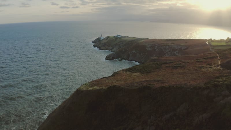 Baily lighthouse on the sea shore in Dublin, Ireland