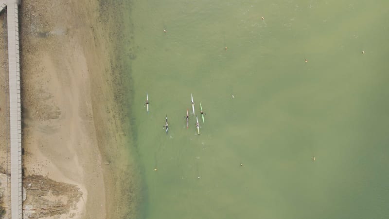 Aerial view of people doing kayak along Mira River, Portugal.