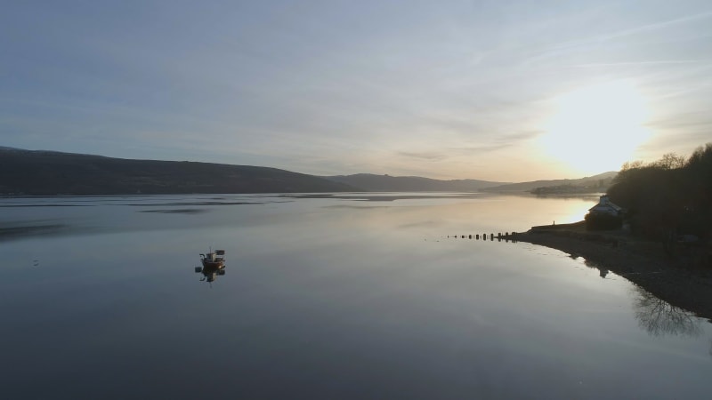 Red Boat in a Loch in Scotland