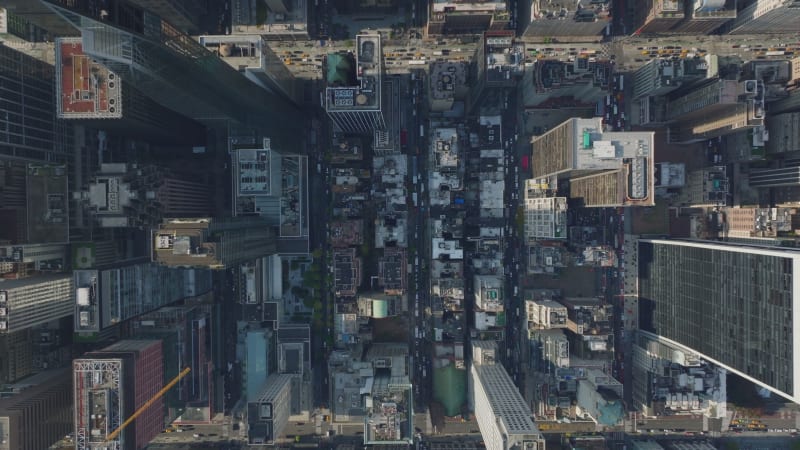 Aerial birds eye overhead top down view of traffic jam on avenue and surrounding streets in city centre. Manhattan, New York City, USA