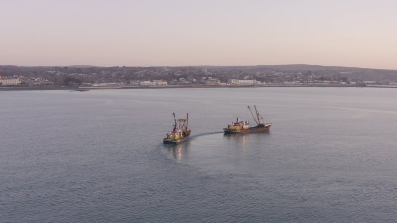 Fishing Trawlers at Sunrise Seen From the Air