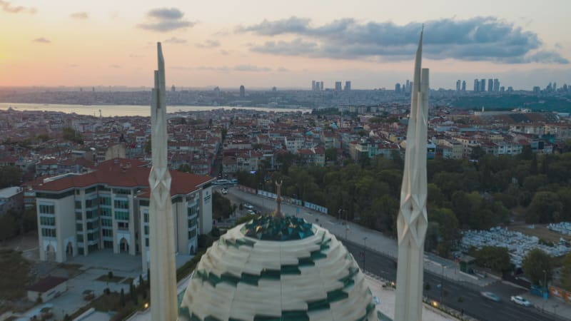 Futuristic Marmara Mosque in Istanbul, Modern looking Mosque at Sunset with Cityscape, Aerial Hyperlapse Drone Time Lapse forward