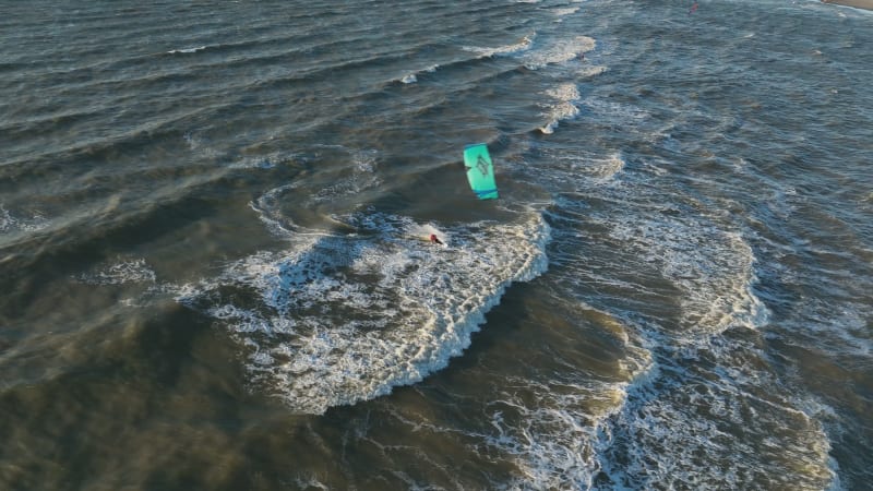 Kitesurfing at Hoek van Holland Beach during Sunset