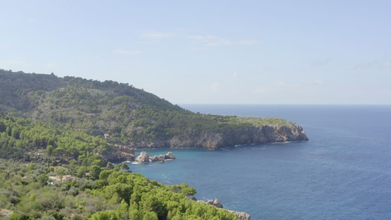 Over Beautiful Coast Line of Tropical Island Mallorca, Spain with ocean and Blue water in Summer,Daylight Vacation, Travel, Sunny, Waves