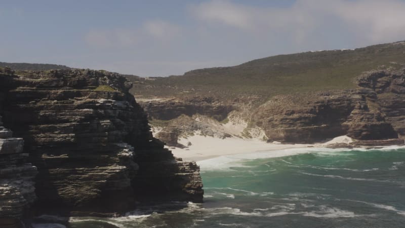 Reveal of rocky sand beach near Cape of Good Hope in South Africa