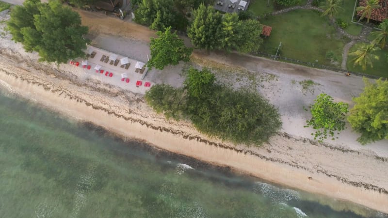 Aerial view of swimming pool in luxury resort.