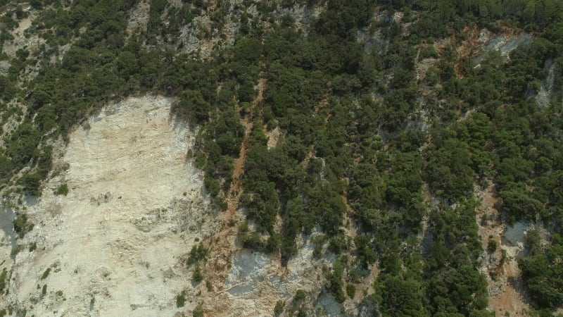 Aerial view of rock formation on the coast.