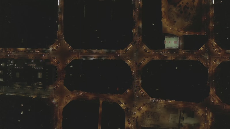 Barcelona Overhead Drone Shot of Typical City Blocks at Night with Beautiful City Traffic lights