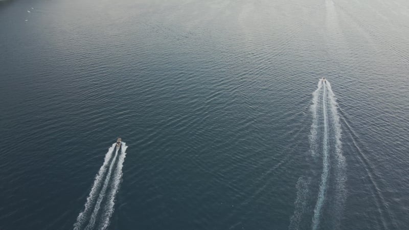 Aerial view of motorboats sailing along the Amalfi coast, Salerno, Italy.