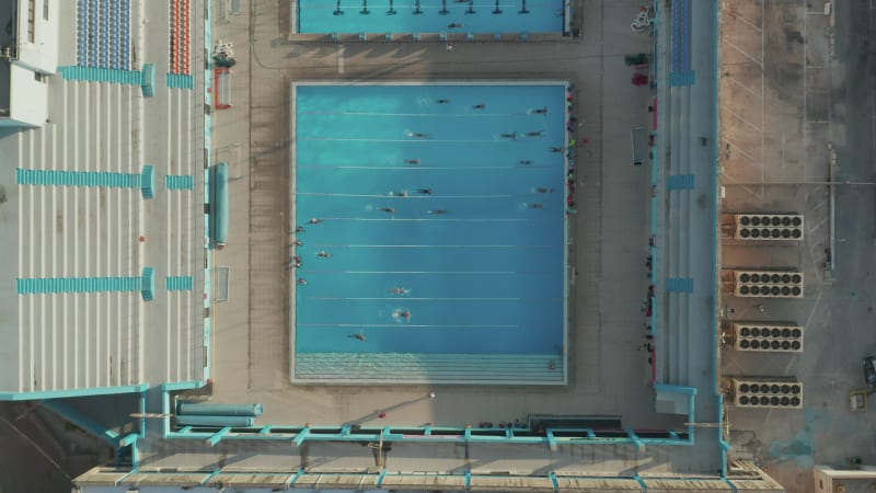 Epic view of training Swimmers doing lanes in Blue Pool in Sunshine