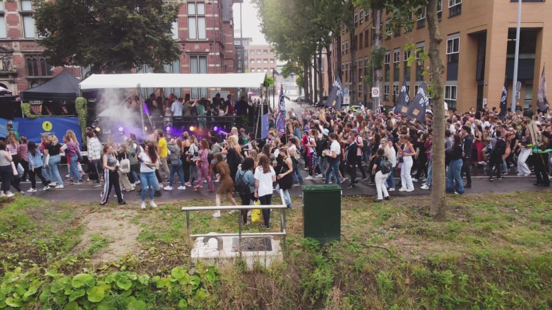 Protesters marching down a street during Unmute Us Campaign in Utrecht, Netherlands.