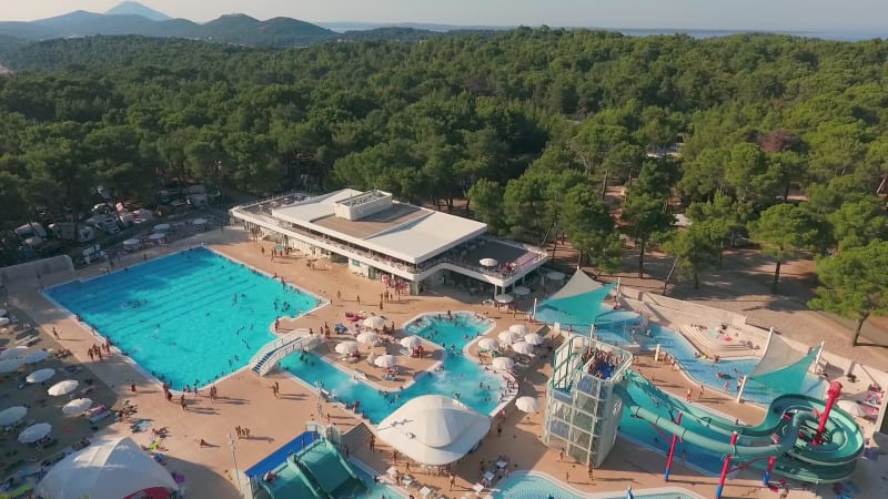 Aerial view above of aquapark full of people, Mali Losinj.