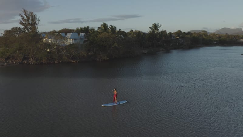 Aerial view of a person paddling at Riviere du Rempart, Mauritius.