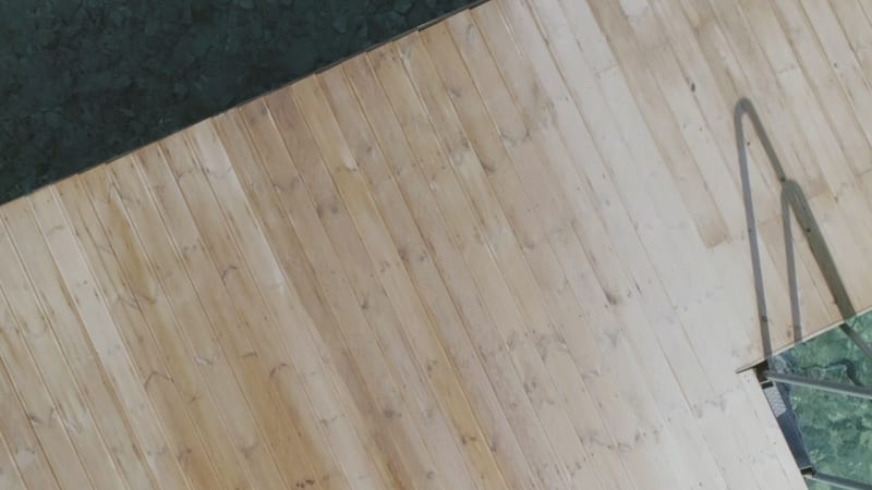 Aerial view of a wooden deck in the mediterranean sea.