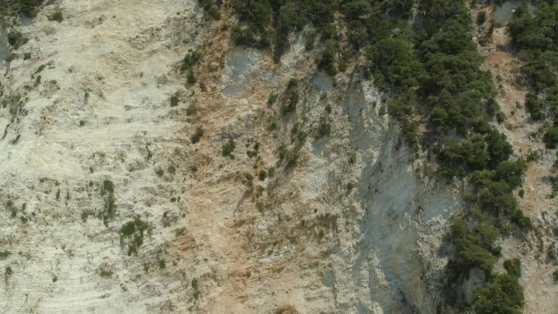 Aerial view of rock formation on the coast.