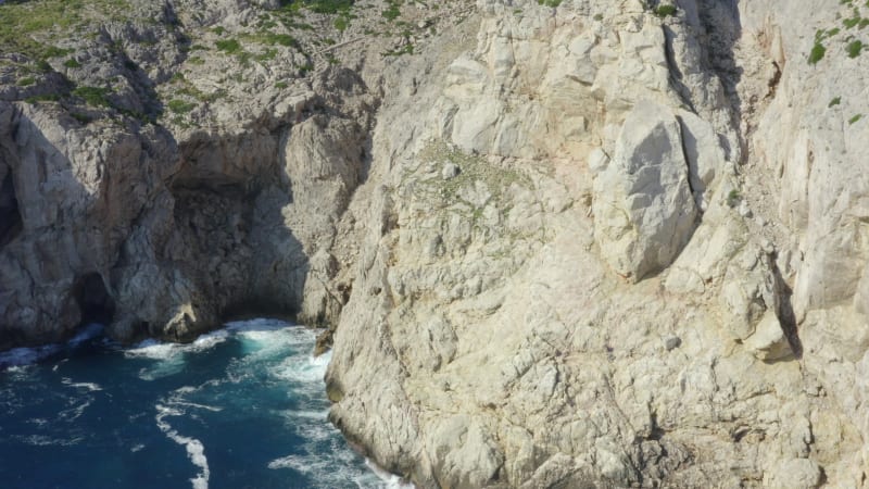 Edge of Cliff with Blue Water Waves on Tropical Island Mallorca, Spain Vacation, Travel, Sunny, Waves