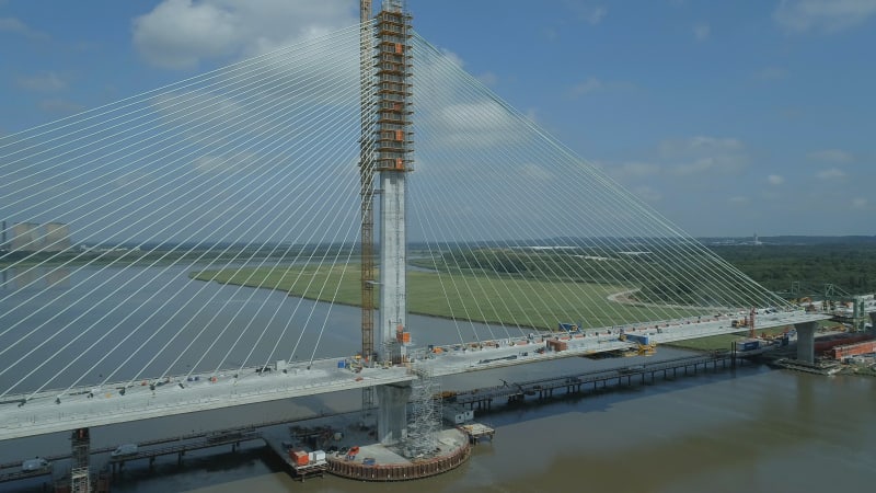 Rising Aerial View of a Cable Stayed Bridge in the Late Construction Phase