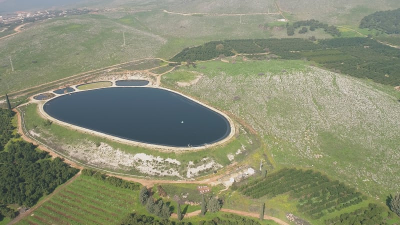 Aerial view of reservoir in a shape of a foot. Amiad, Northern district, Israel