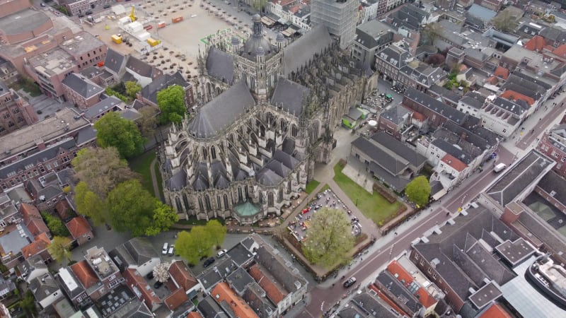 An aerial view orbit shot of St John's Cathedral in  's-Hertogenbosch, Netherlands