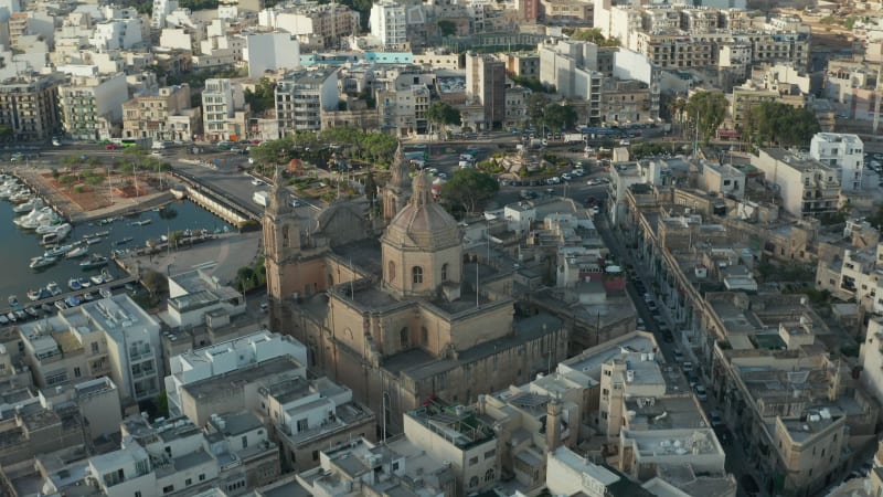 Majestic Beautiful Brown Catholic Church in Msida Town, Malta from Aerial Drone perspective