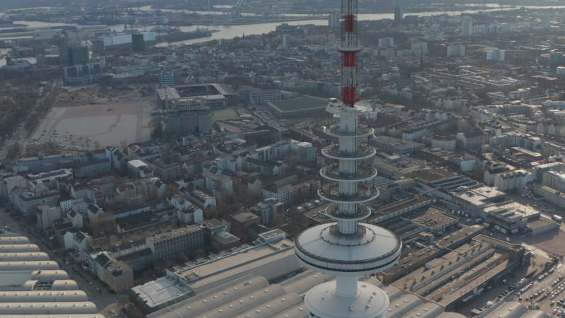 Close up aerial view of red and white antennas on top of Heinrich Hertz TV tower in Hamburg, Germany