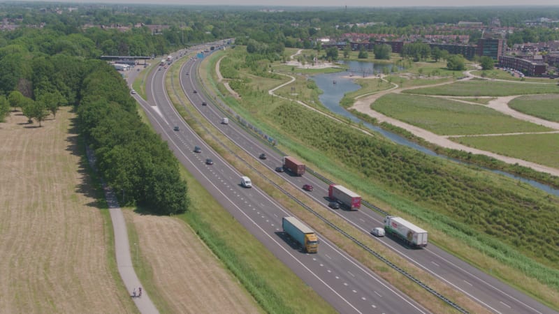 Busy Road Near River and Town in Ermelo