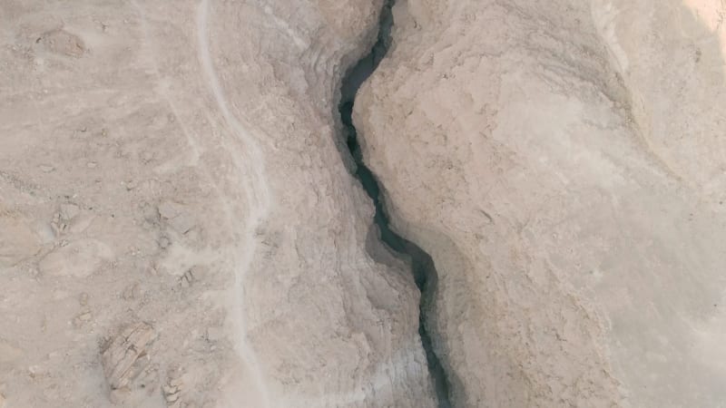 Aerial view of a canyon in the desert, Barak river, Negev, Israel.