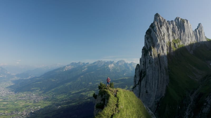 Aerial view of a person hiking on the mountain top, Wasserauen, Switzerland.