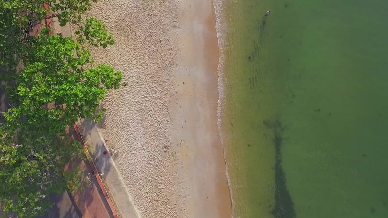 Aerial view above of a calm beach with ripple water, Kep.