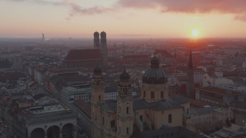 Theatine Church and Frauenkirche Cathedral in Munich Golden Hour Sunset, Aerial Wide Angle View above the City