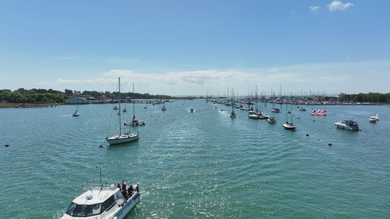 Yachts, Speedboats and Vessels on a River in the Summer