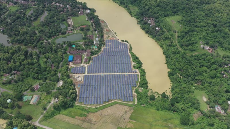 Aerial view of solar panels along Karnaphuli river, Bangladesh.