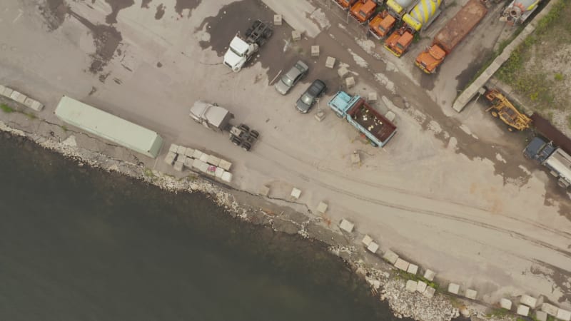 Following grey Cargo truck in docks of New York City Cloudy Grey day