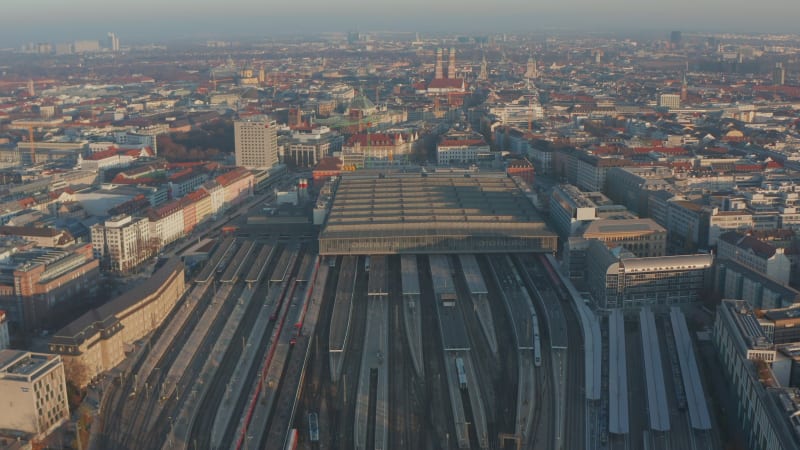 Huge Munich Central Train Station in Germany with little traffic and less traveling due to Coronavirus Covid 19 Pandemic, Aerial Dolly forward