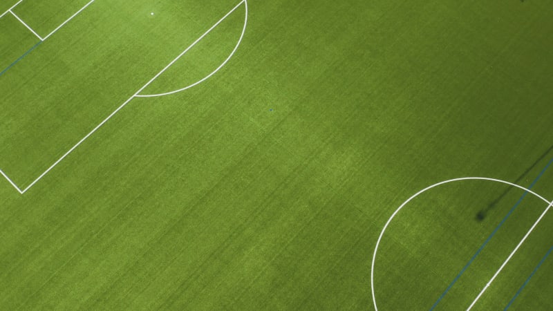 Abstract aerial view of a green football field