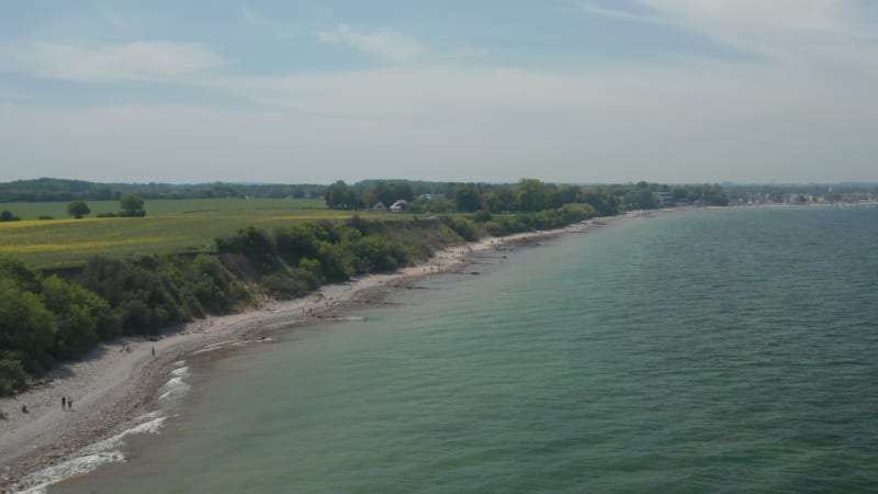 Small beach in Brodten, Germany, facing Baltic sea on a sunny peaceful day, forward, day