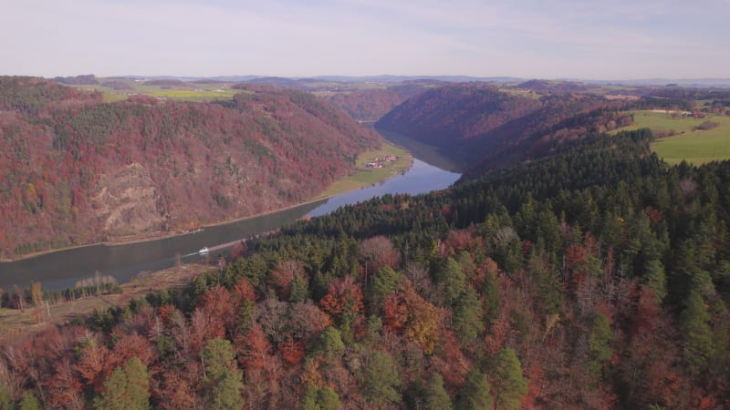 Cargo Pusher Boat on a River Transporting Cargo and Goods Along a Autumnal River