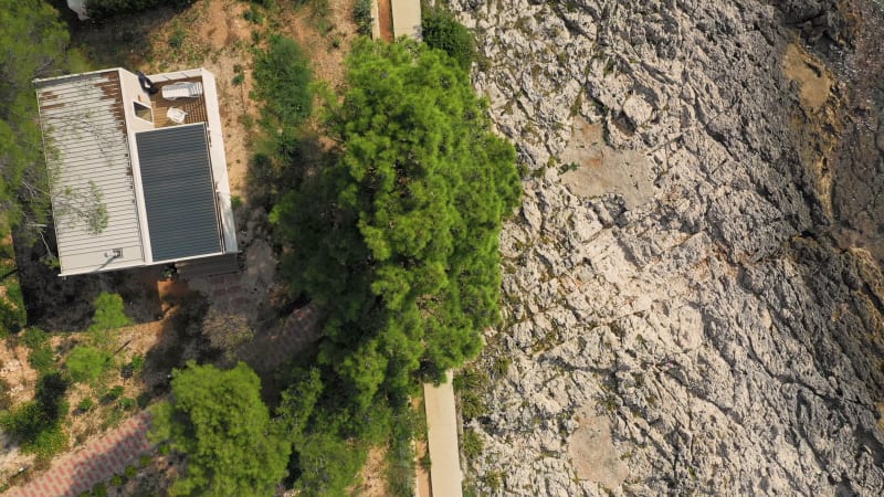 Aerial view of man running at Losinj coastline.