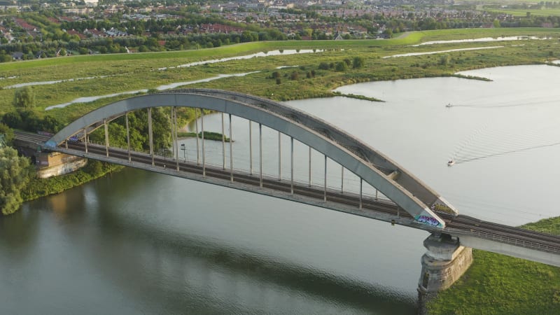 Pull Away Shot of Culemborg's Railway Bridge in the Lek River, the Netherlands