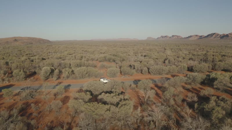 Aerial view of x travelling in the outback.