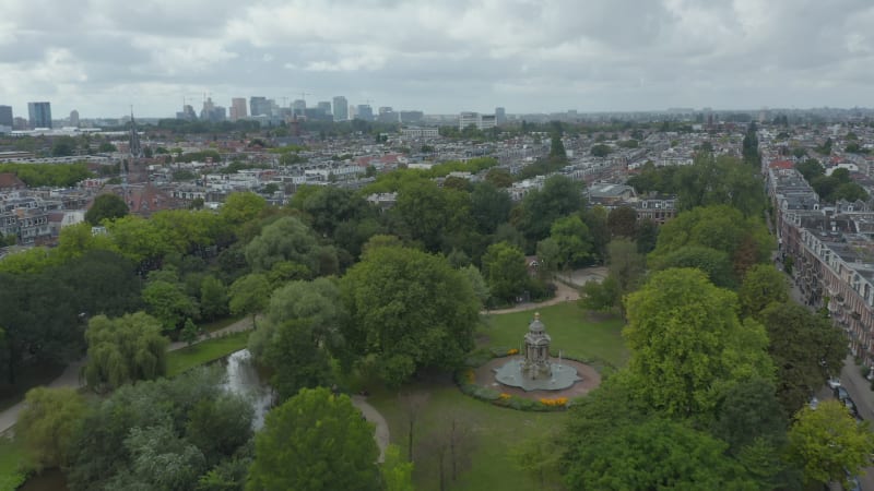 Sarphatipark Public Park in Amsterdam, Forward Aerial on Cloudy Day