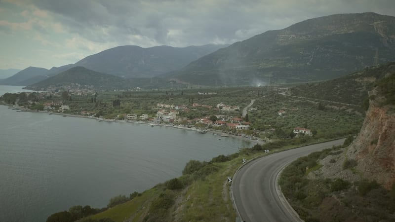 Aerial view of coastal road along seaside.