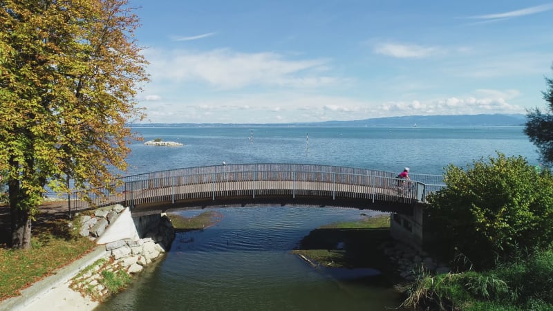 Aerial view of people cycling along Constance Lake, Switzerland.