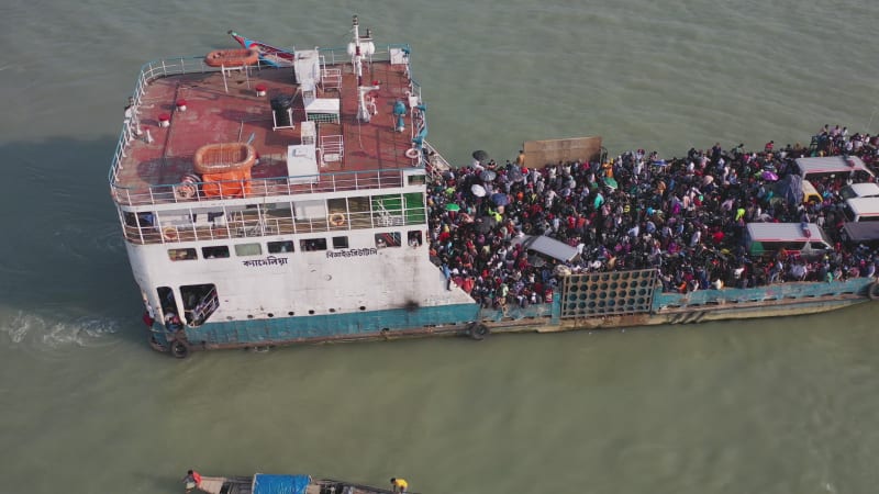 Aerial view of a ferry boat crossing the Padma River, Bangladesh.