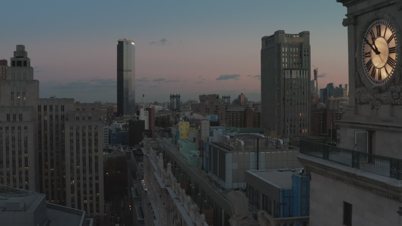 Morning aerial footage of town development in city. Blue color toned shot. Manhattan, New York City, USA