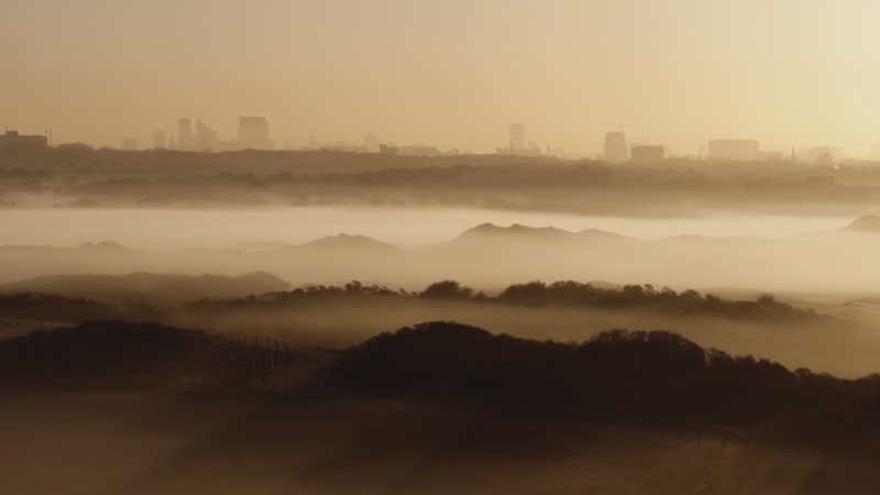 Foggy Morning in Kijkduin with Den Haag in the Distance