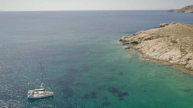 Aerial view of sailing boat in mediterranean, Alithini, Syros island.