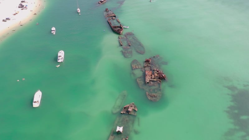 Aerial Flyover of Tangalooma Shipwrecks in Brisbane Australia in the Summer